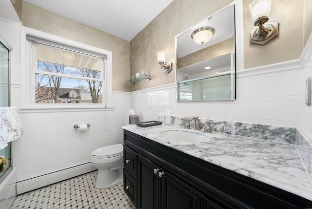 bathroom with baseboard heating, tile walls, and a shower with shower door