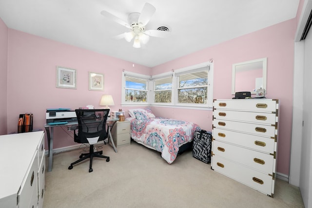 bedroom with light colored carpet and ceiling fan