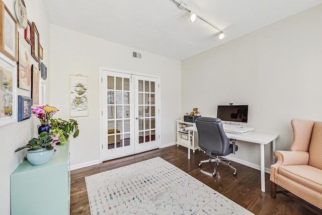 office space featuring french doors, dark wood finished floors, visible vents, and baseboards