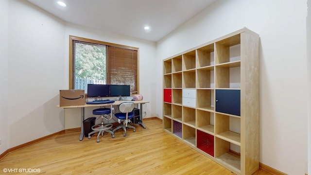 office space featuring recessed lighting, baseboards, and wood finished floors