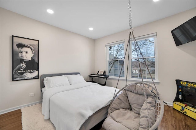 bedroom featuring recessed lighting, baseboards, and wood finished floors