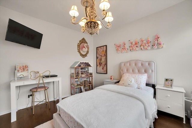 bedroom with a notable chandelier, dark wood-style floors, and baseboards