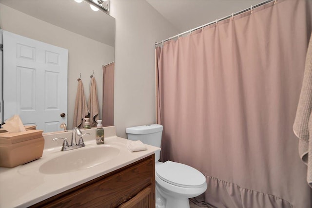 full bath featuring toilet and vanity