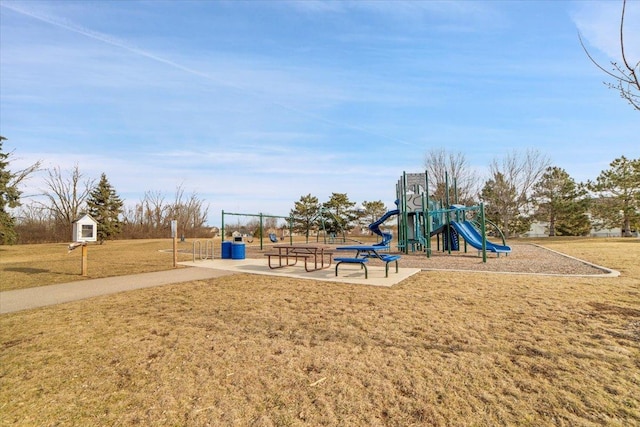 community playground featuring a lawn