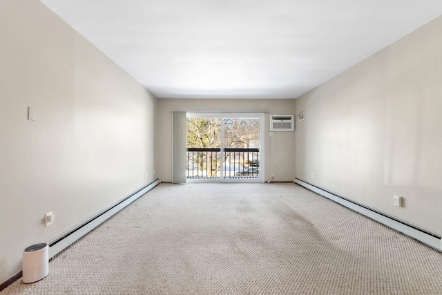 carpeted spare room featuring baseboard heating, a wall mounted AC, and baseboards