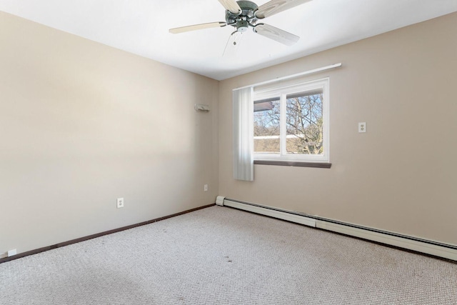 carpeted empty room featuring a baseboard radiator, baseboards, and ceiling fan