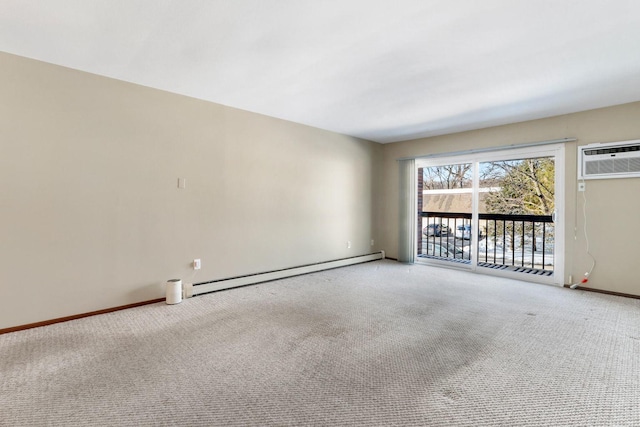 spare room featuring a baseboard radiator, an AC wall unit, baseboards, and carpet