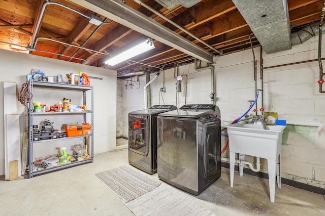 washroom featuring washer and dryer and laundry area