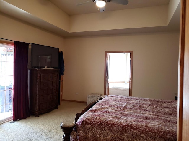 bedroom with baseboards, carpet, and a ceiling fan