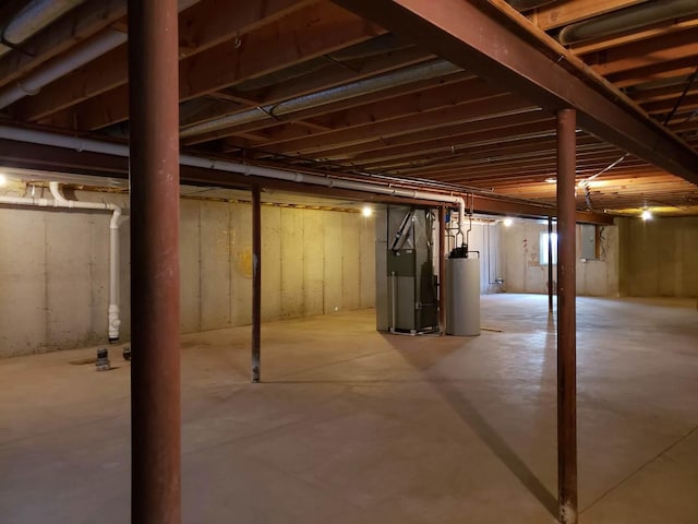 unfinished basement with heating unit and water heater