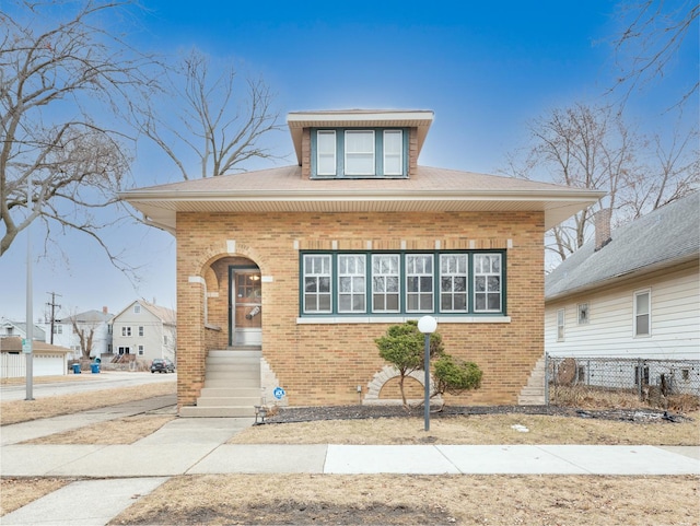 view of front of property with brick siding