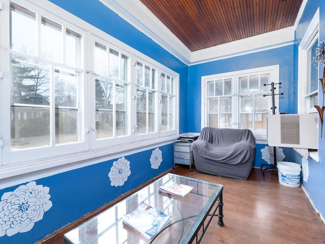 sunroom with a wealth of natural light and wood ceiling