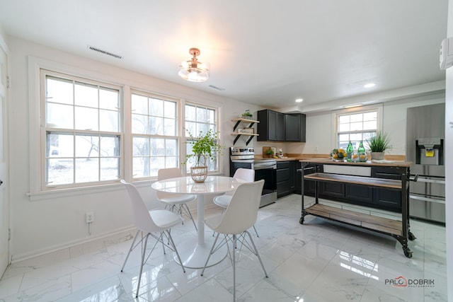 dining space featuring recessed lighting, marble finish floor, visible vents, and baseboards