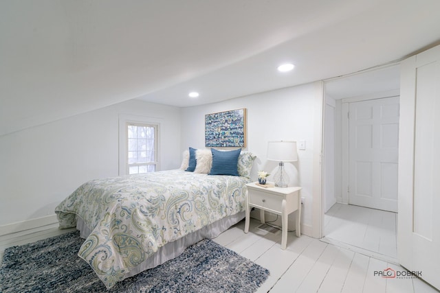 bedroom featuring baseboards and recessed lighting