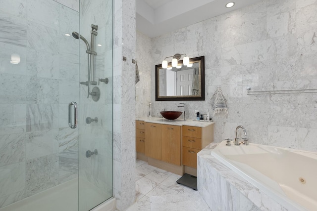 bathroom featuring a stall shower, tile walls, vanity, and a bath