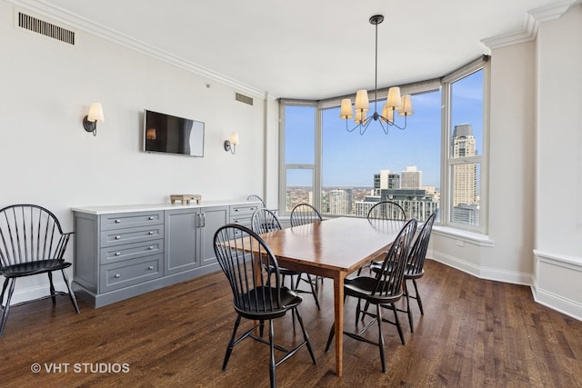 dining room with visible vents, baseboards, dark wood-style flooring, and crown molding