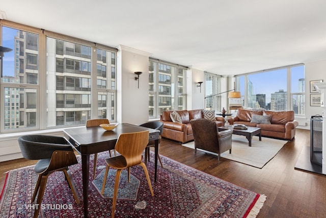 sunroom / solarium featuring a view of city