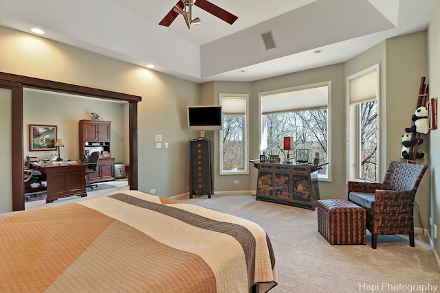 bedroom with visible vents, recessed lighting, baseboards, light colored carpet, and ceiling fan