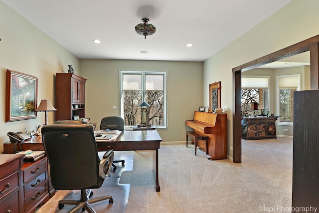 office with light carpet, recessed lighting, a healthy amount of sunlight, and baseboards