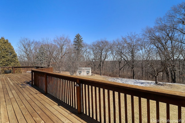 deck featuring an outdoor structure