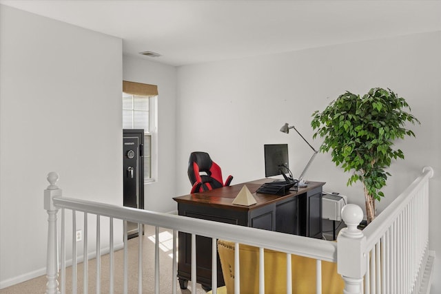 office space featuring baseboards and carpet