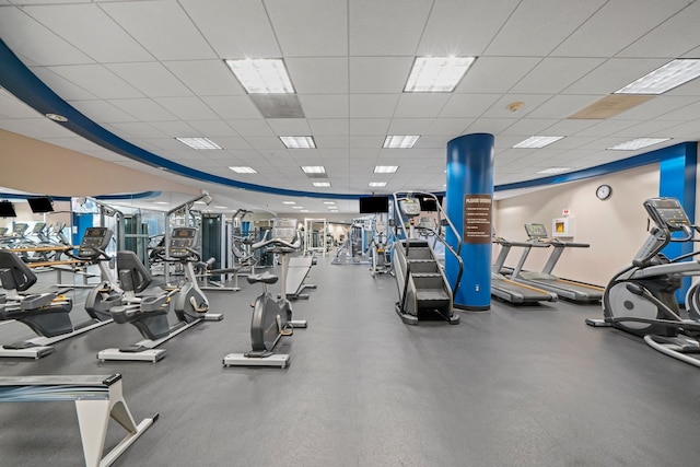 gym featuring a paneled ceiling