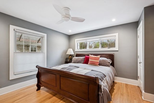 bedroom featuring light wood-style floors, ceiling fan, recessed lighting, and baseboards