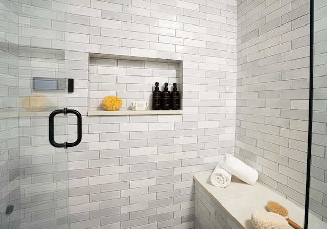 bathroom with a shower stall