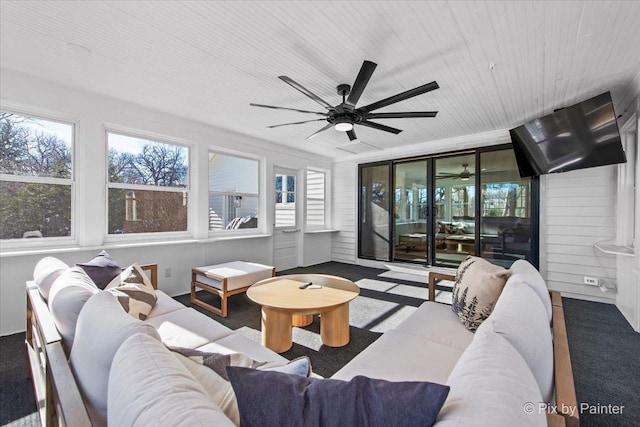 living room with wood ceiling and ceiling fan