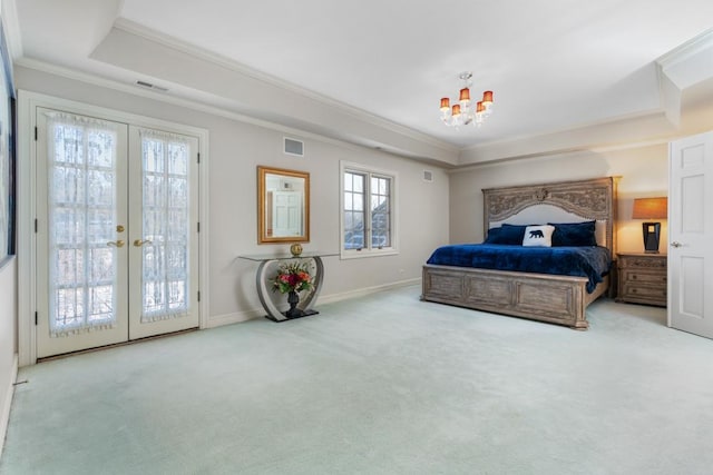 bedroom with visible vents, access to outside, ornamental molding, french doors, and a tray ceiling