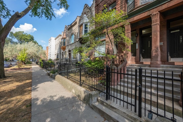 exterior space with a fenced front yard