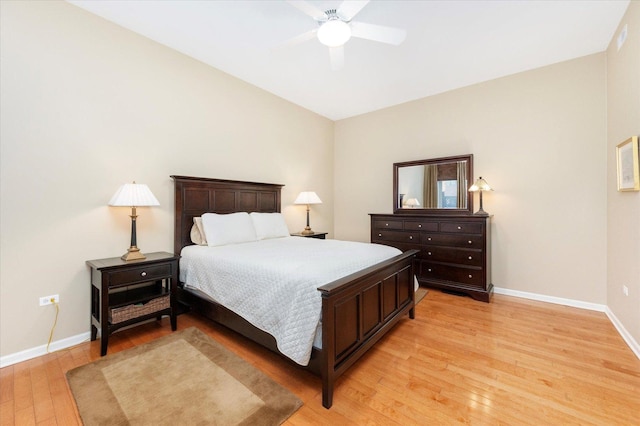 bedroom with baseboards, light wood-style floors, and ceiling fan