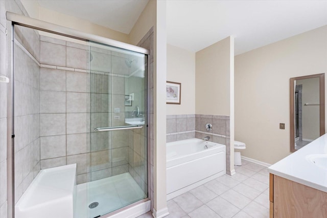 bathroom with tile patterned flooring, toilet, and a stall shower