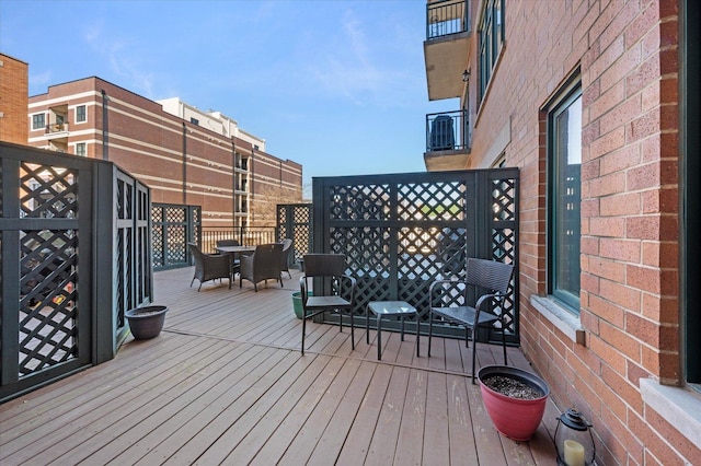 deck featuring outdoor dining space