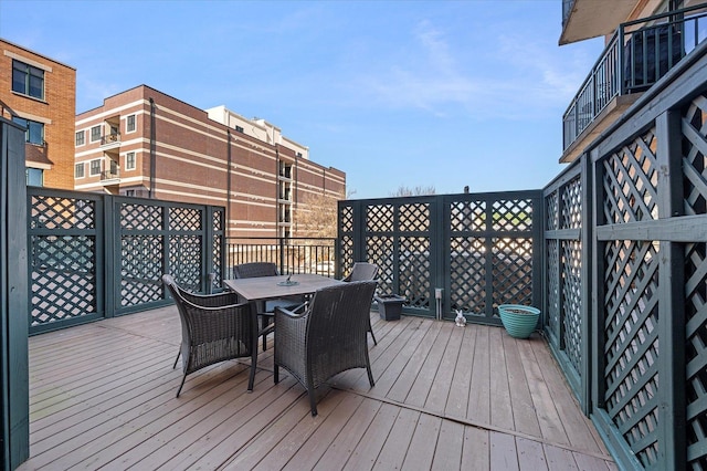 deck with outdoor dining space