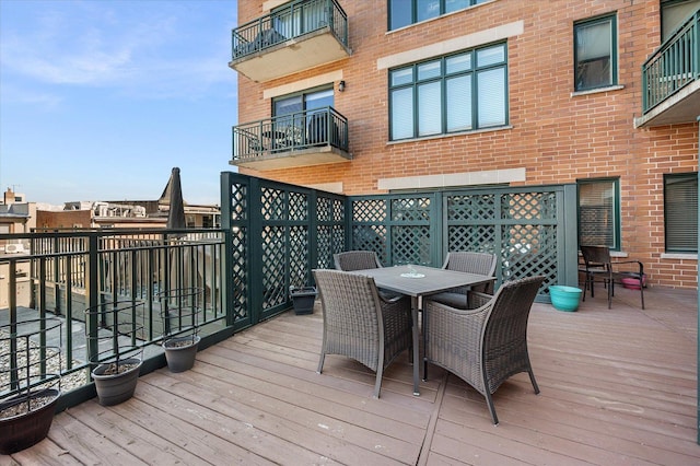 deck featuring outdoor dining space