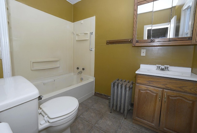 bathroom featuring  shower combination, radiator, vanity, and toilet