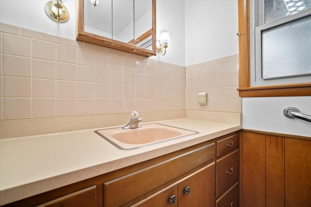 bathroom featuring wainscoting and vanity