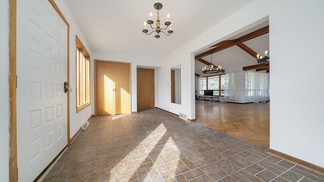 foyer entrance featuring baseboards, visible vents, beamed ceiling, an inviting chandelier, and brick floor