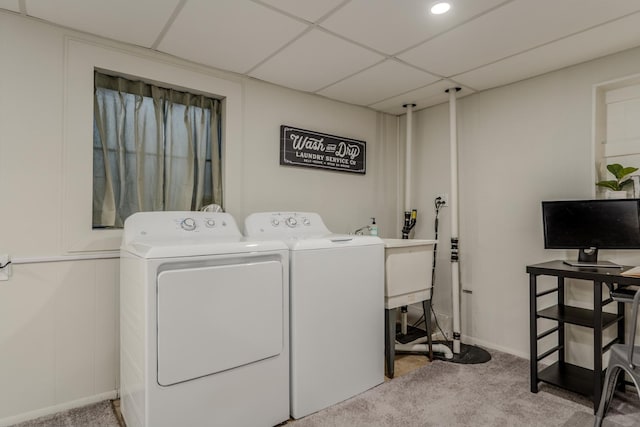 laundry room with carpet floors, laundry area, and washing machine and clothes dryer