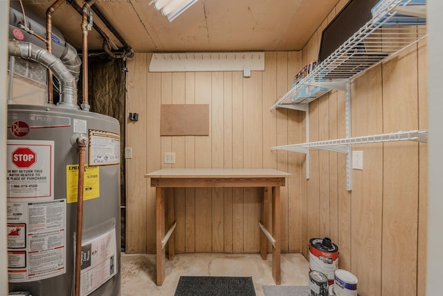 utility room featuring water heater