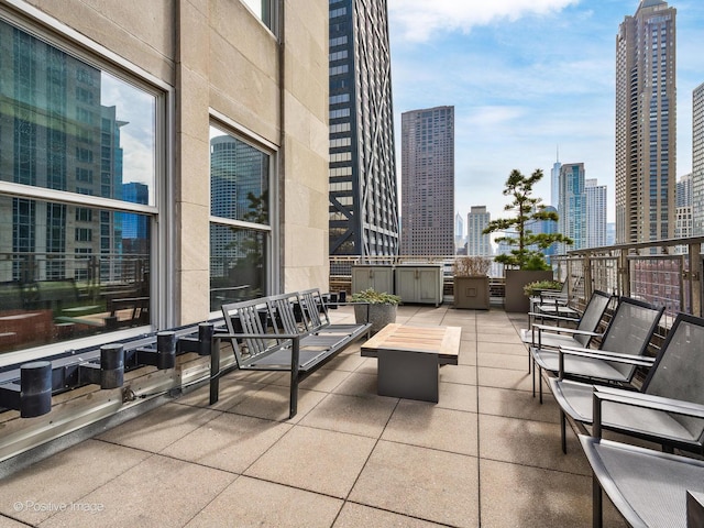 view of patio / terrace with a view of city