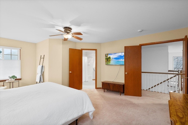 bedroom with carpet flooring, a ceiling fan, and baseboards