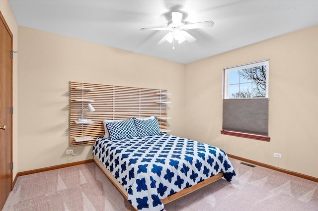 bedroom featuring carpet floors, visible vents, ceiling fan, and baseboards