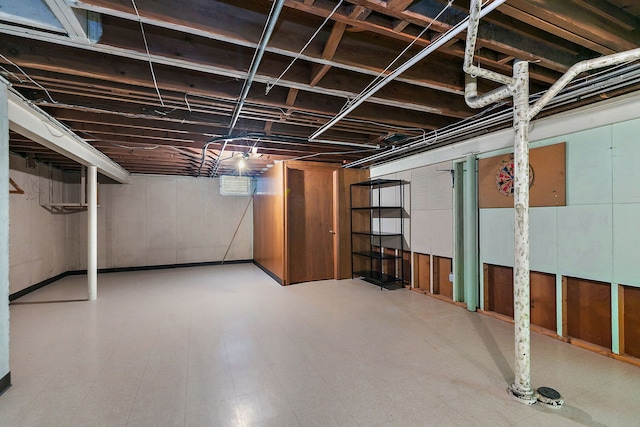 basement featuring tile patterned floors