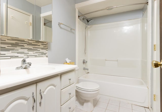 full bathroom with tasteful backsplash, toilet, tub / shower combination, vanity, and tile patterned floors