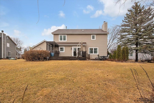 back of house with a lawn, a chimney, and a pergola