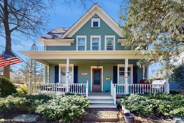 victorian house featuring covered porch