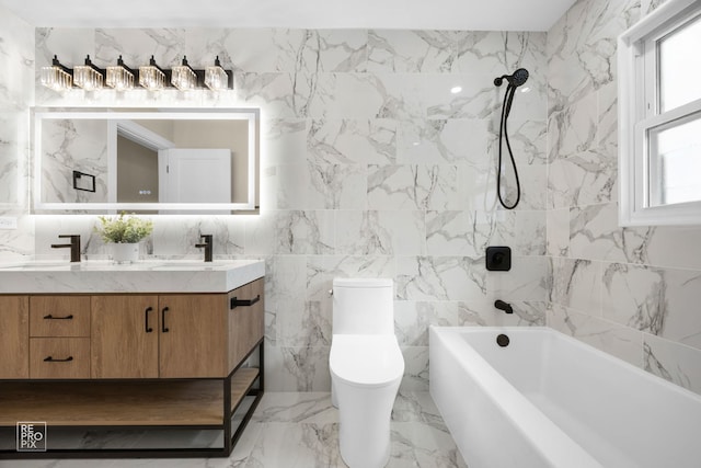 full bathroom with a sink, washtub / shower combination, toilet, and double vanity