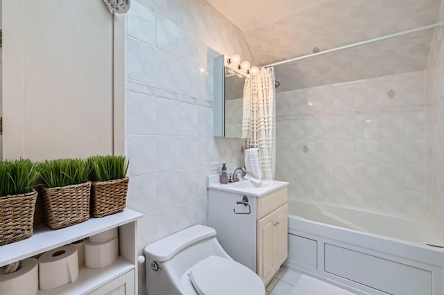 bathroom featuring vanity, tile walls, toilet, and shower / bathtub combination with curtain